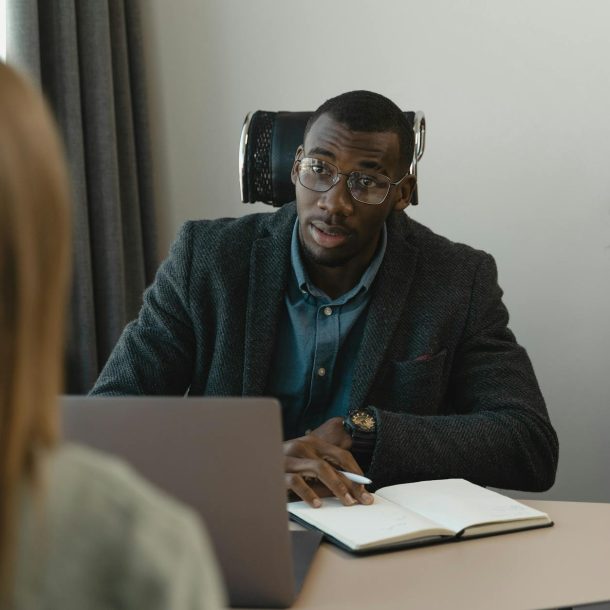 man talking to an applying woman